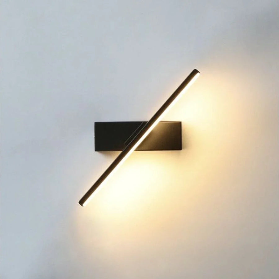 Arandela LED Linear Preta Rotativa — arandela led linear preta instalada em ambiente